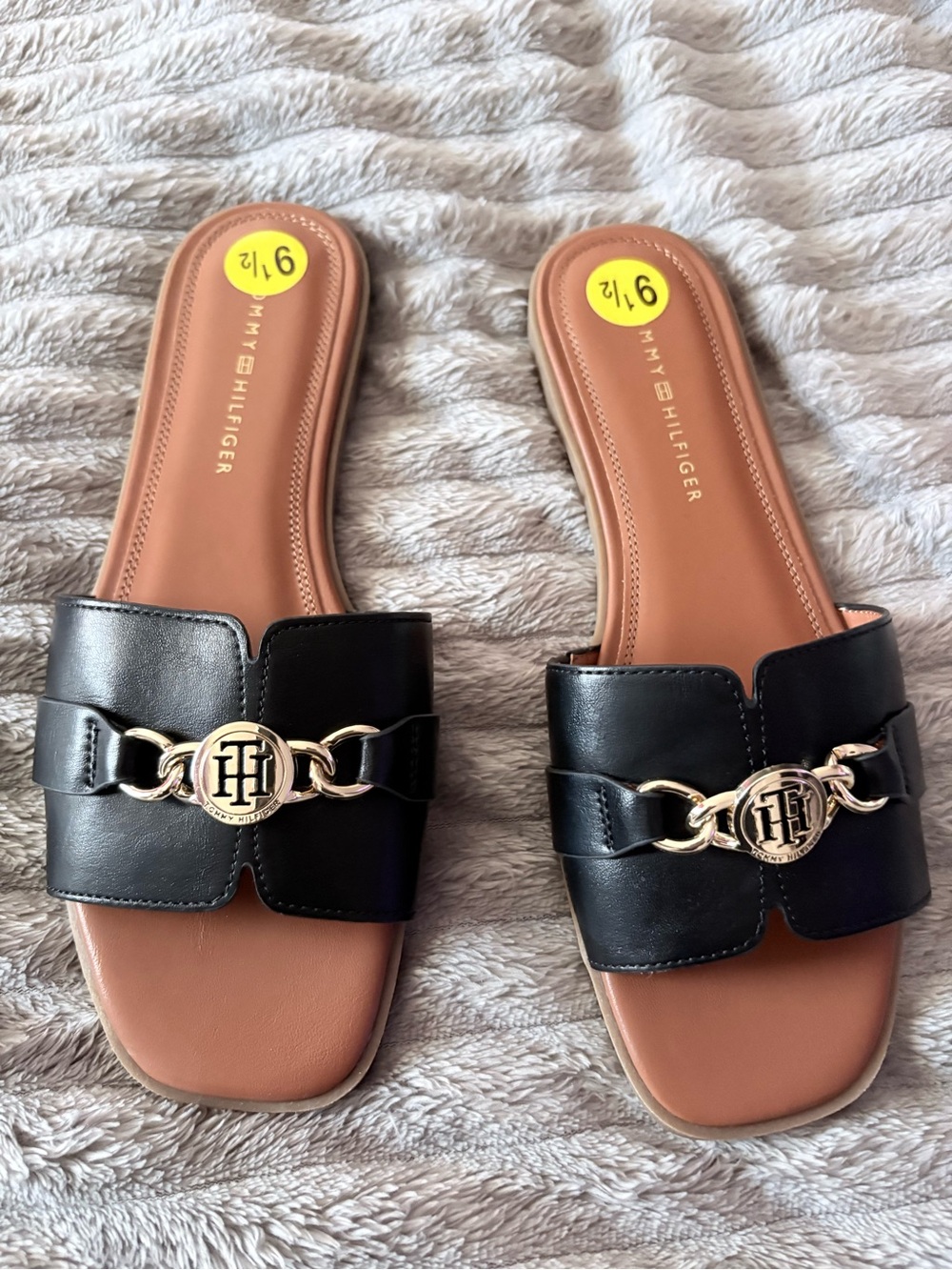 Tommy Hilfiger Black and Brown Slide Mules with Gold Emblem